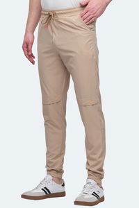 Slazenger - Slazenger NADJA Erkek Cepli Dar Paça Bej Eşofman Altı Slazenger - Slazenger NADJA Erkek Cepli Dar Paça Bej Eşofman Altı