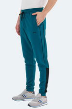 Slazenger - Slazenger VALARY Erkek Cepli Dar Paça Petrol Eşofman Altı Slazenger - Slazenger VALARY Erkek Cepli Dar Paça Petrol Eşofman Altı