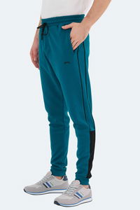 Slazenger - Slazenger VALARY Erkek Cepli Dar Paça Petrol Eşofman Altı Slazenger - Slazenger VALARY Erkek Cepli Dar Paça Petrol Eşofman Altı