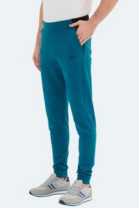 Slazenger - Slazenger VESSEL Erkek Fermuar Cepli Dar Paça Petrol Eşofman Altı Slazenger - Slazenger VESSEL Erkek Fermuar Cepli Dar Paça Petrol Eşofman Altı